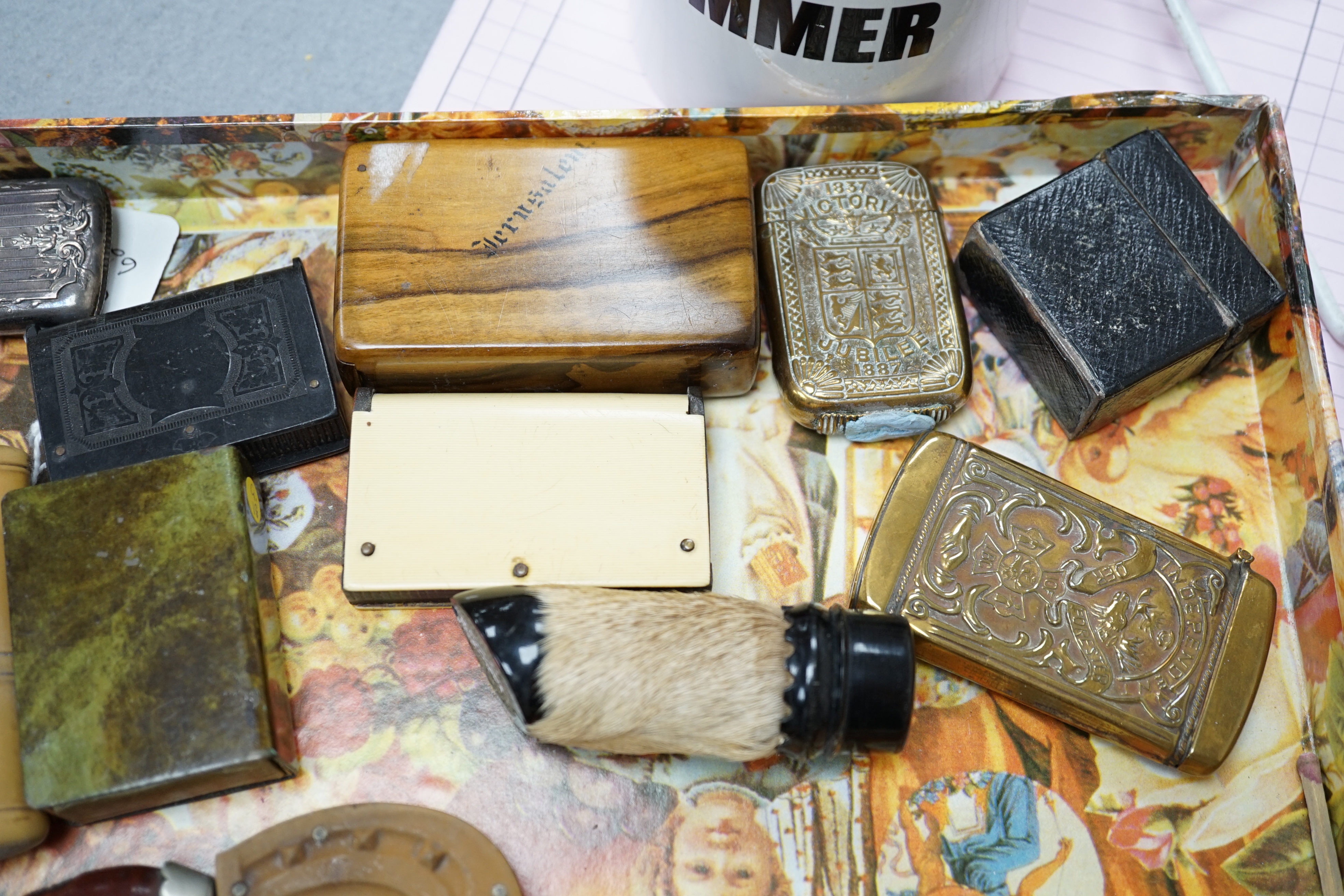 A collection of Victorian and later vestas and matchbox holders, some commemorative